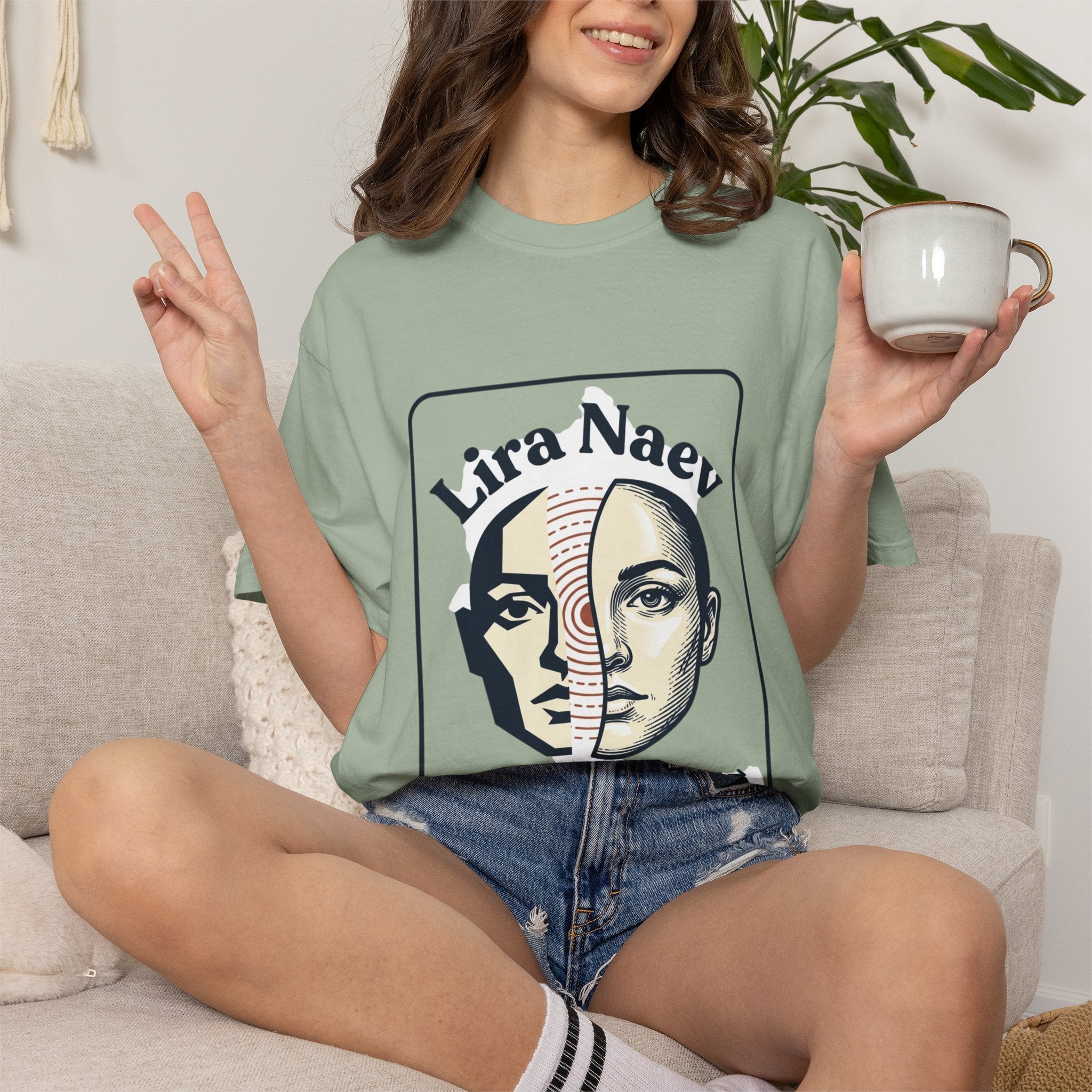 Power Runs Black PRB Lira Naev Split-Face Graphic T-Shirt — “Perception shifts the center” Statement Tee by Printify